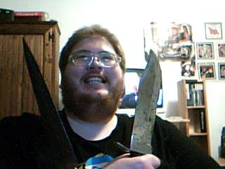 <img0*240:stuff/me_with_knives.jpg>