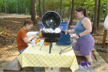 <img0*300:stuff/z/26733/Kaleigh%2527s%2520photos%2520-%2520camping/Shana%20and%20I%20cooking.jpg>